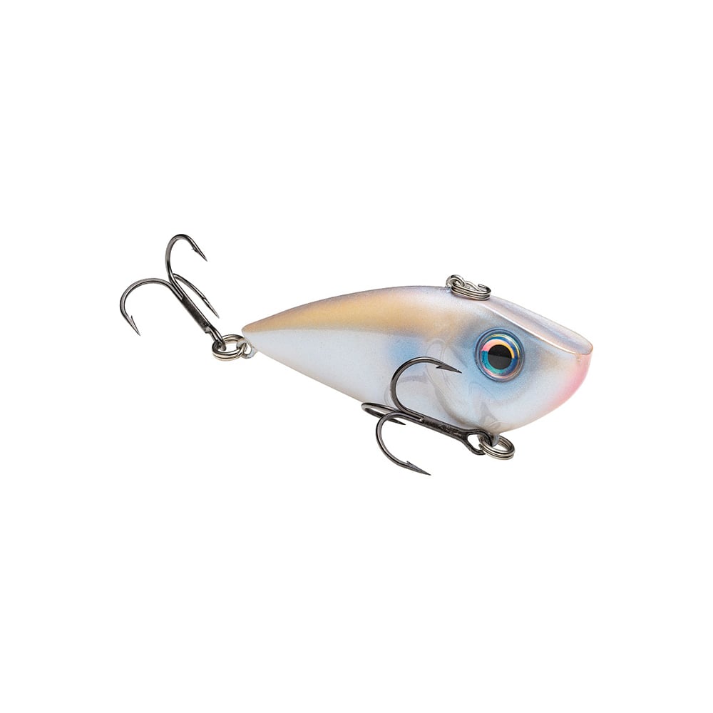 The Strike King Red Eye Shad by Strike King is a shad-shaped lipless crankbait with a metallic finish, blue accents near the eye, pro tour-grade treble hooks at the tail and underneath, shown against a white background.
