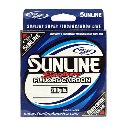 The Sunline Super Fluorocarbon packaging showcases a blue box and white text emphasizing "200 yds." and "Made in Japan." Logos highlight its abrasion resistance and sensitivity, showcasing its exceptional tensile strength.