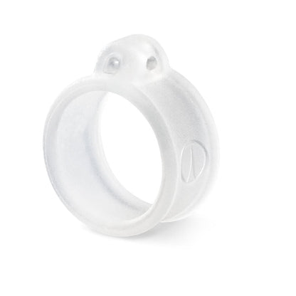 The VMC Crossover Rings, by VMC, feature a transparent silicone design with circular smoothness and small top protrusions. Their flexible and shiny surface stands out elegantly against the plain white background.