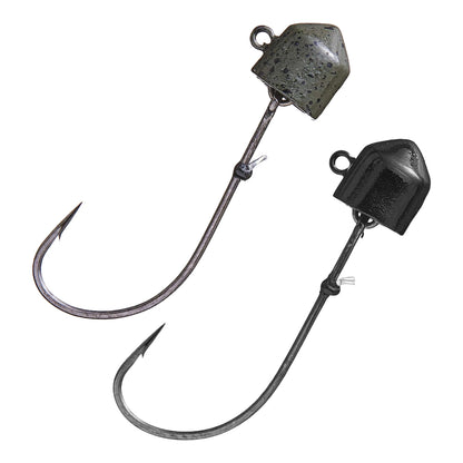 The VMC Swingin Ned Rig Jighead includes two fishing hooks with green speckled and solid black jigheads designed to attract fish. They feature sharp, curved hooks on weighted heads and an adjustable fluorocarbon keeper for added versatility.