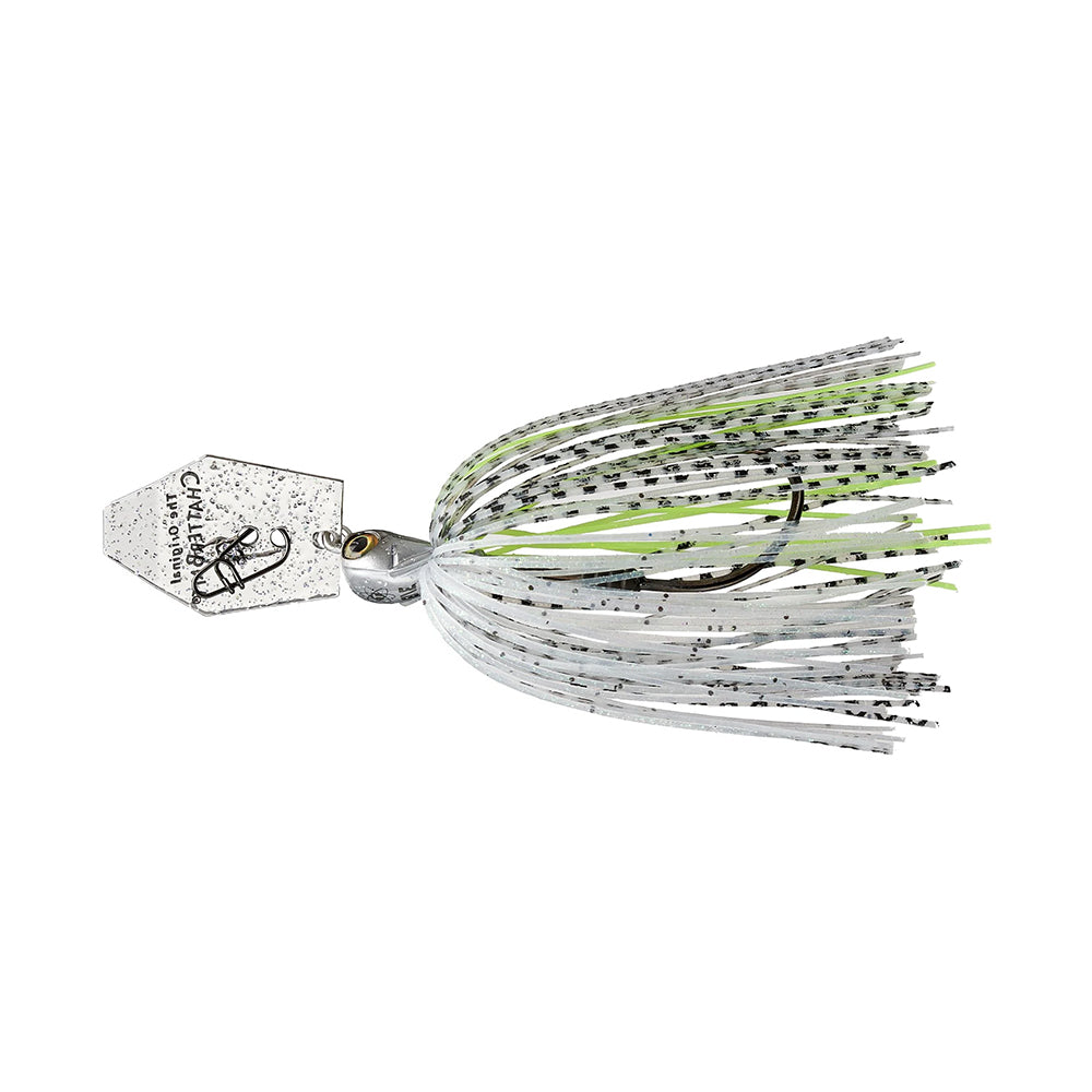 The Z-Man Chatterbait Elite Tungsten EVO by Z-Man features a silver hexagonal blade, a gray fish-shaped head, and a skirt with white, gray, light green strands speckled with black, plus a single hook.