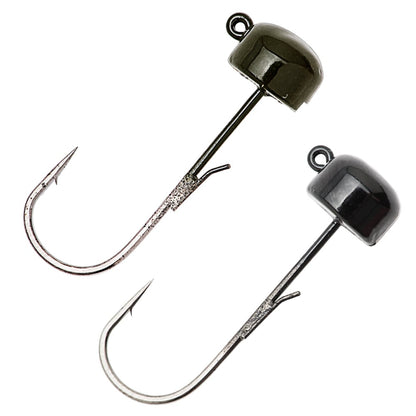 Two Z-Man Finesse ShroomZ jig heads from Z-Man, featuring rounded weighted heads and sharp barbs, designed for the Ned Rig and pairing perfectly with ElaZtech baits, shown side by side on a white background.