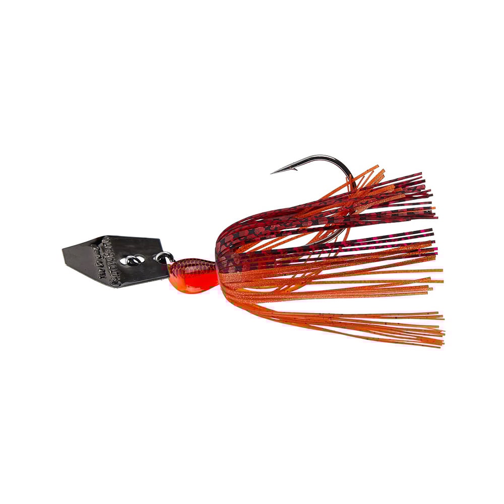 The Z-Man Original Chatterbait by Z-Man features a black angular head, attached hook, red and orange skirt of thin strands, and a hex-shaped blade for added attraction. A red bead further entices your catch.