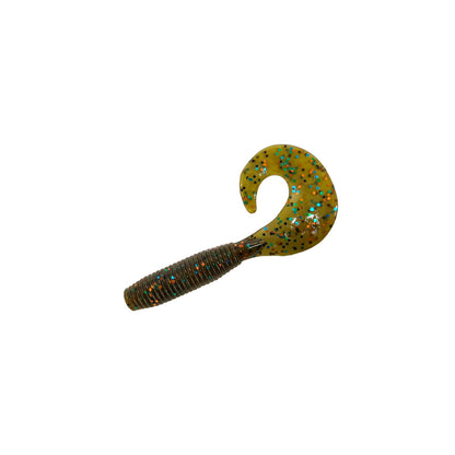 The Zoom Fat Albert Grubs by Zoom is a soft plastic fishing lure with a chunky, ribbed body and curly tail, featuring a greenish-yellow color accented with blue and black glitter. The lure is shown isolated on a white background.
