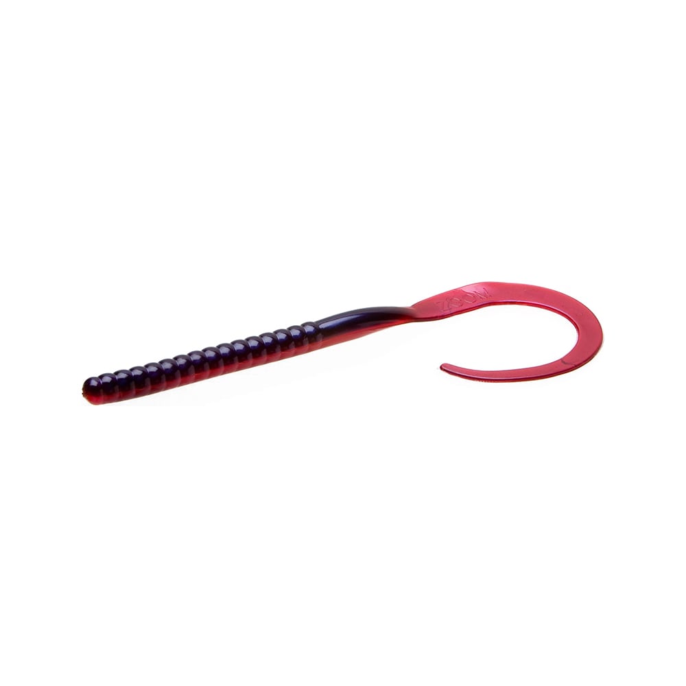 The Zoom Ol' Monster by Zoom is a soft plastic big worm lure in dark purple with a ribbed body and large curled tail, ideal for tournament anglers after big bass. Shown isolated on a white background.
