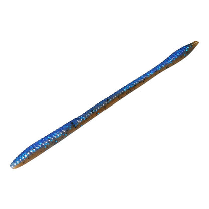 A detailed view of a Zoom Trick Worm, segmented and made from synthetic material. It features a brown body with a blue, textured top and black speckles, designed to lure shallow water bass.