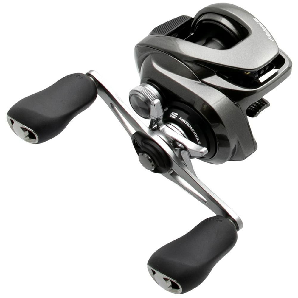 The Shimano Metanium MGL 150XGB 8.1:1 Casting Reel by americanlegacyfishing features a silver and black design with two ergonomic handles, compact build, precision knobs, and a Magnesium CoreSolid Body for smooth casting and control.