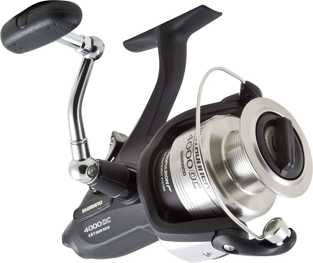 Close-up of the SHIMANO Baitrunner OC BTR4000OC Spinning Reel by Shimano, highlighting its handle, spool, bail arm, and branded details with the Propulsion Line Management System against a white background.