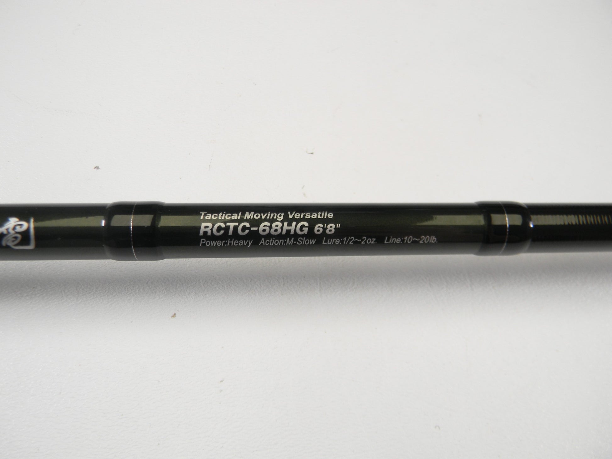 A close-up of an Evergreen Combat Stick RCTC-68HG Tactical Moving Versatile 6'8" Heavy Glass Used Casting Rod in excellent condition; great for our Rod and Reel Trade-In Program or as used gear store credit.