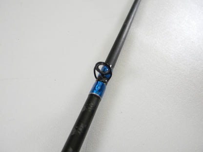 Close-up of a Shimano SLX SLXCX610MA 6'10" Medium casting rod in excellent used condition, featuring a blue-wrapped guide—ideal for those shopping used gear or interested in our rod and reel trade-in.