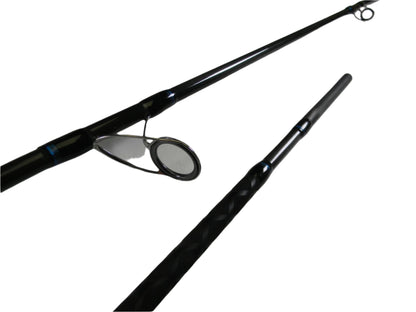 Close-up of the Tsunami Air Wave Elite TSAWESS802LT 8'0" 2 Piece Used Spinning Rod in excellent condition, featuring its guide ring and textured handle—ideal for shoppers seeking quality pre-owned gear.