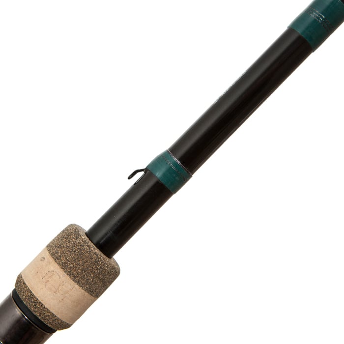 Close-up of the G. Loomis Conquest CNQ 782C MBR Mag Bass Casting Rod handle, featuring a cork grip, black shaft with green accents, small hook keeper, and advanced Spiral-X Technology for superior casting performance.