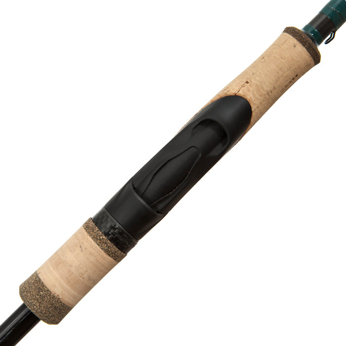 Close-up of a G. Loomis Conquest CNQ 902S SJR Spin Jig Spinning Rod handle, showing a cork grip, black reel seat, and advanced Spiral-X Technology.