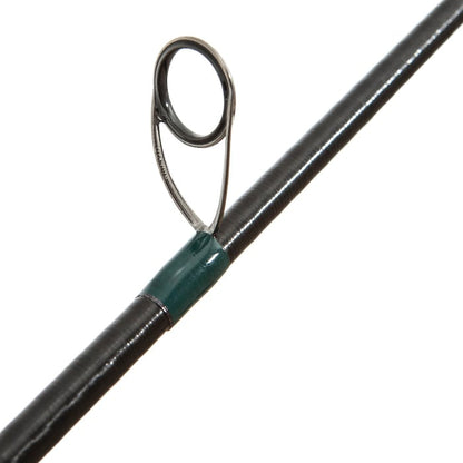 Close-up of a guide ring on the G. Loomis Conquest CNQ 782S SJR Spin Jig Spinning Rod, attached to the dark blank and secured with wrapped thread—precision-engineered by G. Loomis for premium bass fishing performance.