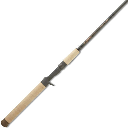 The G. Loomis Walleye Fishing Rod WBBR853C GLX, featuring a cork handle and grey reel seat, is shown angled diagonally on a white background. Designed by G. Loomis for outstanding GLX sensitivity.