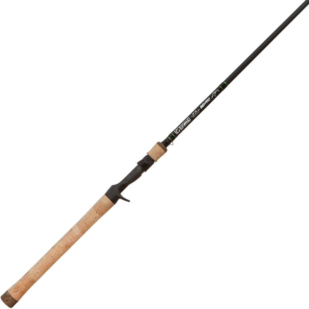 The G. Loomis IMX-PRO 903C CBR Casting Rod—featuring a long cork handle, black reel seat, and slender black blank—is ideal for crankbait fishing. Brand and model info is printed near the grip.