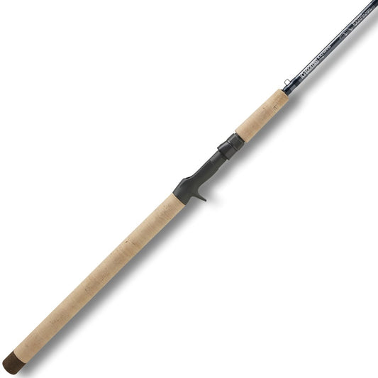 The G. Loomis Salmon Backbounce Fishing Rod SABBR963C features a light cork handle, black trigger grip reel seat, and a blue graphite blank for enhanced sensitivity.