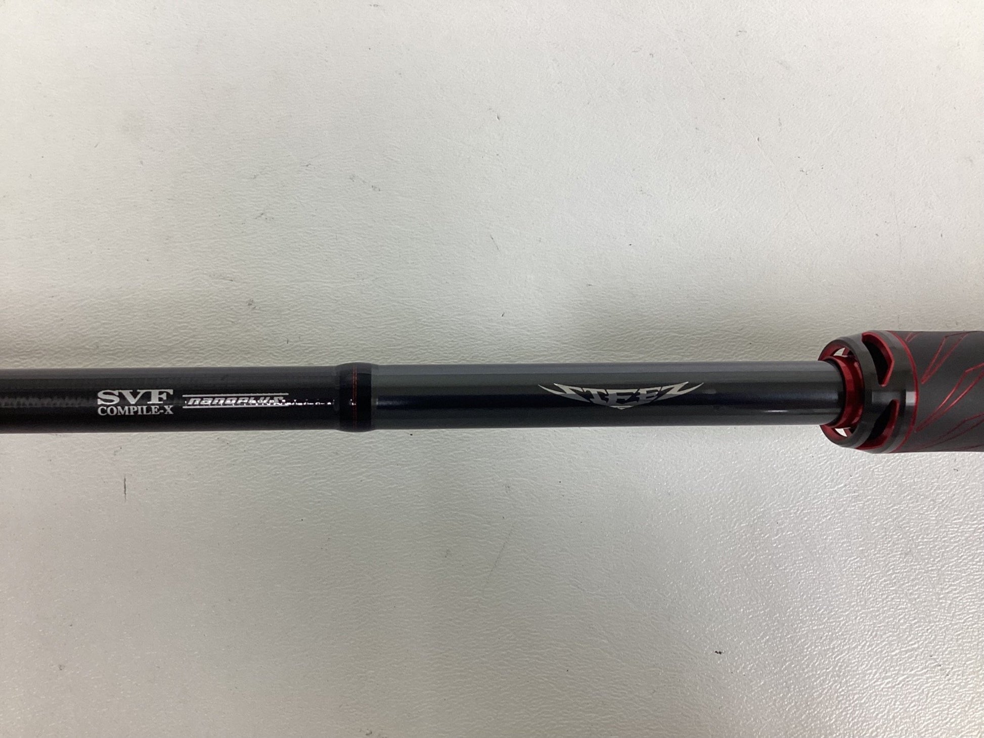 A close-up of a Daiwa Steez AGS STAGS691MHFB Used Casting Rod in excellent condition, featuring the Daiwa logo and stylish accents—ideal for our Rod and Reel Trade-In or choosing high-quality used gear.