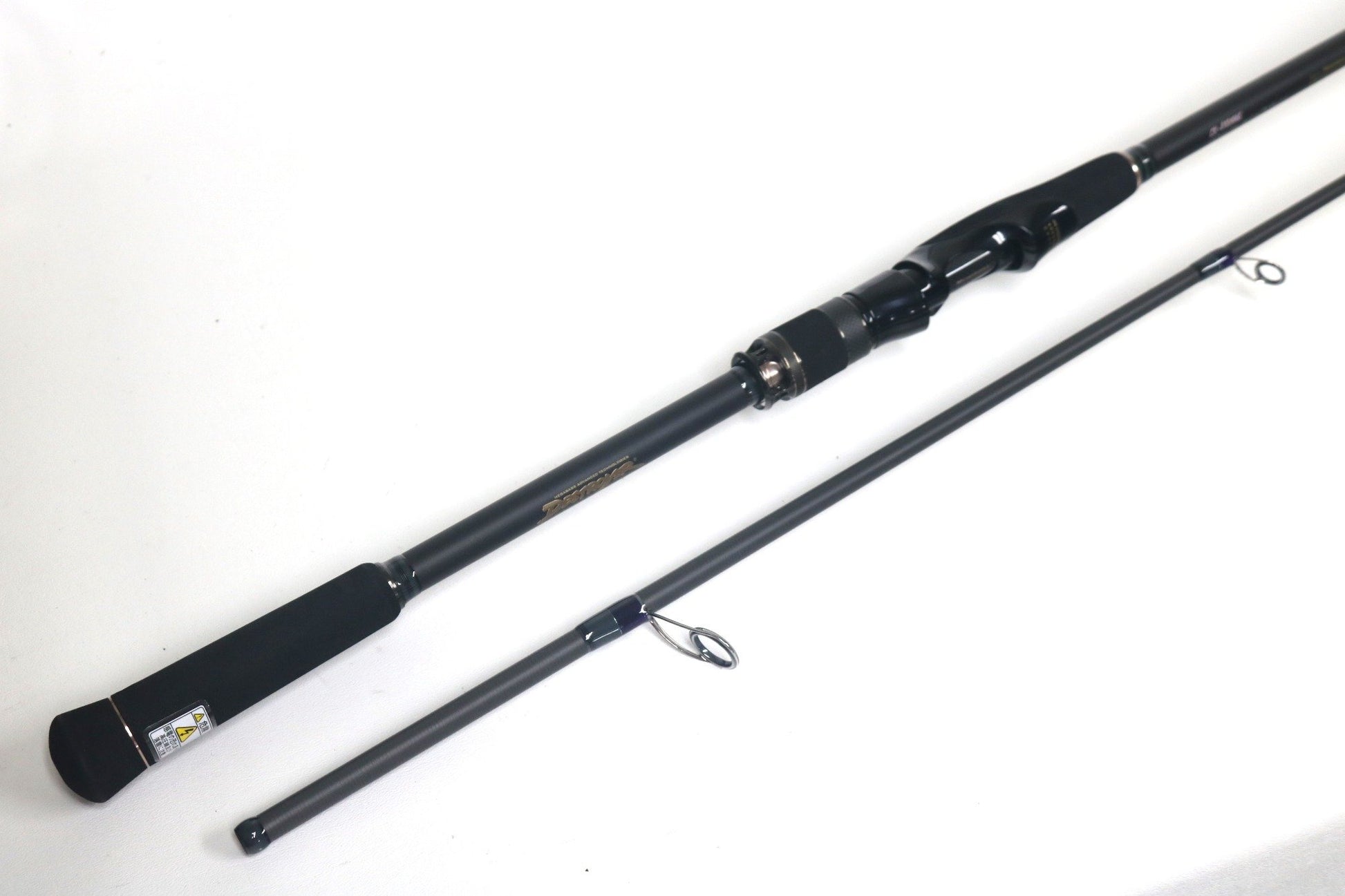 The Megabass Cookai Inshore Spinning Rod - CK810MHS (Used, Excellent) features a black handle and silver reel seat. Upgrade with our Rod and Reel Trade-In Program to earn store credit for your used gear.