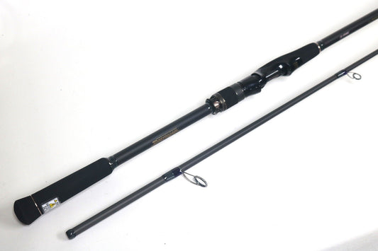 The Megabass Cookai Inshore Spinning Rod - CK810MHS (Used, Excellent) features a black handle and silver reel seat. Upgrade with our Rod and Reel Trade-In Program to earn store credit for your used gear.