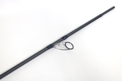 A close-up of the Megabass Cookai Inshore Spinning Rod (CK810MHS) in black, highlighting a metal line guide against a white background—ideal for showcasing this used, excellent-condition Megabass rod for our Trade-In Program.