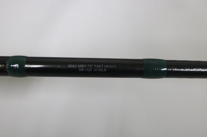 A close-up of the G. Loomis Conquest CNQ 904C MBR 7'6" Heavy Used Casting Rod in very good condition—ideal for upgrading with our Rod and Reel Trade-In Program.