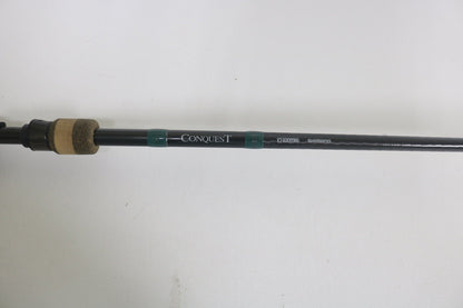 Close-up of a G. Loomis Conquest CNQ 903C MBR 7'6" Medium Heavy Used Casting Rod in good condition—ideal for those interested in our rod and reel trade-in program or wanting to upgrade used gear for store credit. Brand: G. Loomis.
