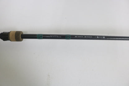 A close-up of the G. Loomis Conquest CNQ 903C MBR 7'6" Medium Heavy Used Casting Rod in good condition, featuring a cork handle, black reel seat, and visible specs on a plain white background—ideal for those upgrading gear or exploring trade-in options.