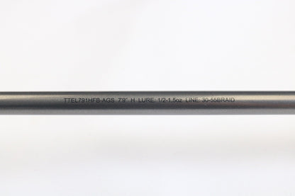 Close-up of a Daiwa Tatula Elite AGS TTEL791HFB-AGS Long Cast Frog 7'9" Heavy, showing lure (1/2–1.5oz) and line (30–55 braid) specs. Used casting rod in very good condition—perfect for trade-in or used gear buyers.