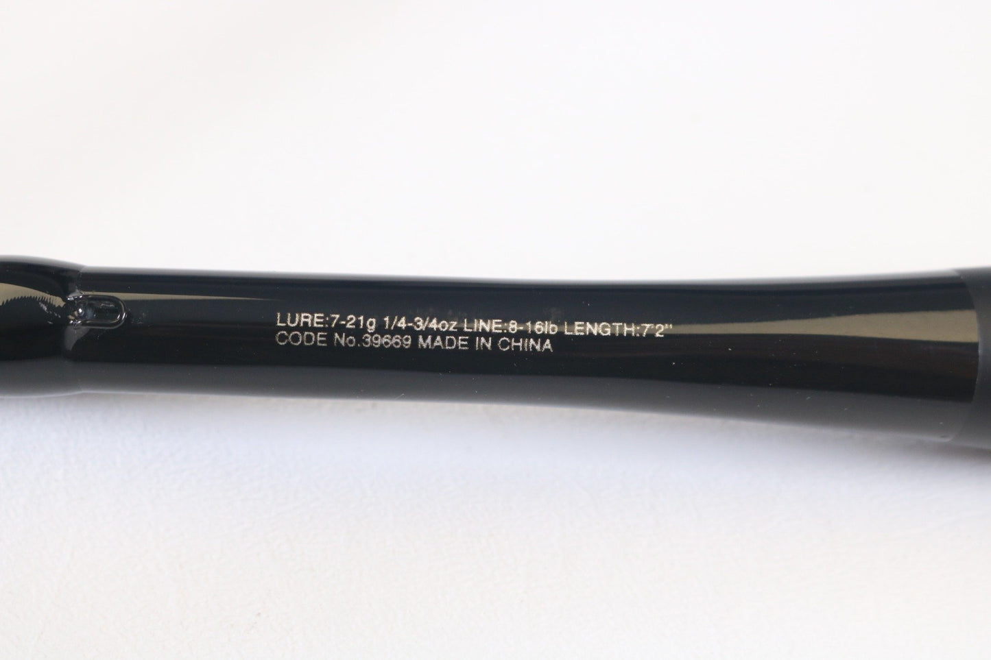 Close-up of a Shimano Zodias ZDC72MA 7'2" Medium rod with specifications: Lure 7-21g, Line 6-16lb. Features code 39669 and "Made in China." Ideal for upgrading used gear through our Rod and Reel Trade-In Program for store credit. Displayed on a white background.