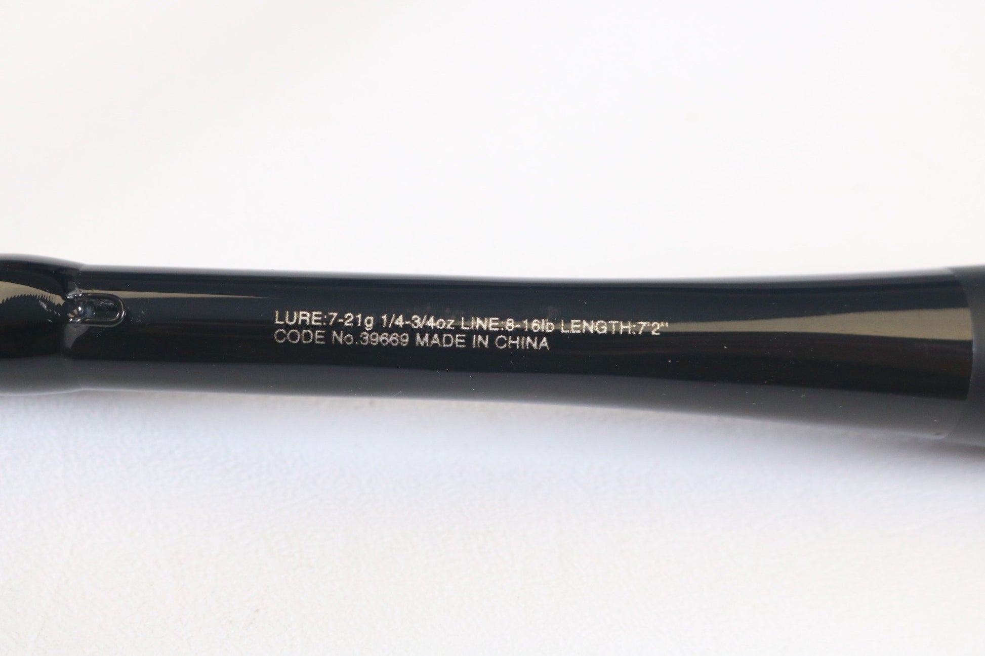 Close-up of a Shimano Zodias ZDC72MA 7'2" Medium rod with specifications: Lure 7-21g, Line 6-16lb. Features code 39669 and "Made in China." Ideal for upgrading used gear through our Rod and Reel Trade-In Program for store credit. Displayed on a white background.