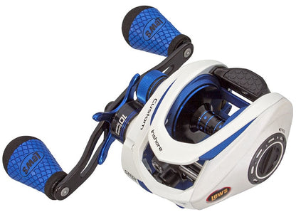 A close-up of the Lew's Custom Inshore Speed Spool 7.5:1 Casting Reel (CI1SH) in white and blue, featuring textured blue handles with black fish scale patterns and the Lew's logo.