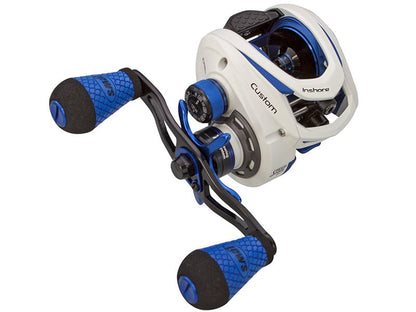 The Lew's Custom Inshore Speed Spool 7.5:1 Casting Reel (CI1SH) features a white and blue design, black handle, and textured blue grips.