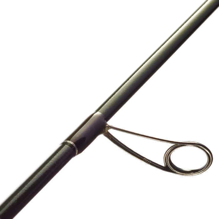 Close-up of a St. Croix Legend Elite 6'6" Medium Light Spinning Rod (ES66MLF), focusing on a single metal guide ring with Integrated Poly Curve technology, set against a white background.