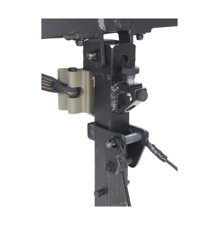 Close-up of a Millennium M60U Ultralite Aluminum Hang-On Treestand’s black metal joint with bolts, hinge, beige clamp, and attached black strap. Brand: Millennium. Model: M-060-SL w/ SafeLink.