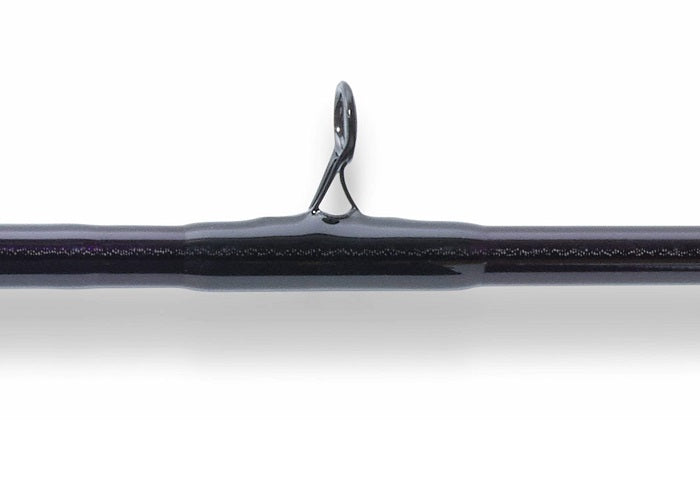 Close-up of a St. Croix Mojo Jig 6'6" Medium Conventional Rod (MJJC66MMF), highlighting one of its line guides against a white background.