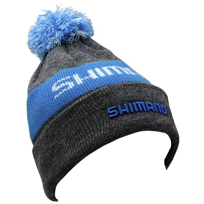 Embrace the cold in style with the Shimano Multi-Color Beanie from Shimano, featuring a striking gray and blue design. "SHIMANO" is elegantly embroidered on the front, accompanied by a playful pom-pom and a chic blue stripe. Enjoy extra warmth with its cozy fleece-lined interior.