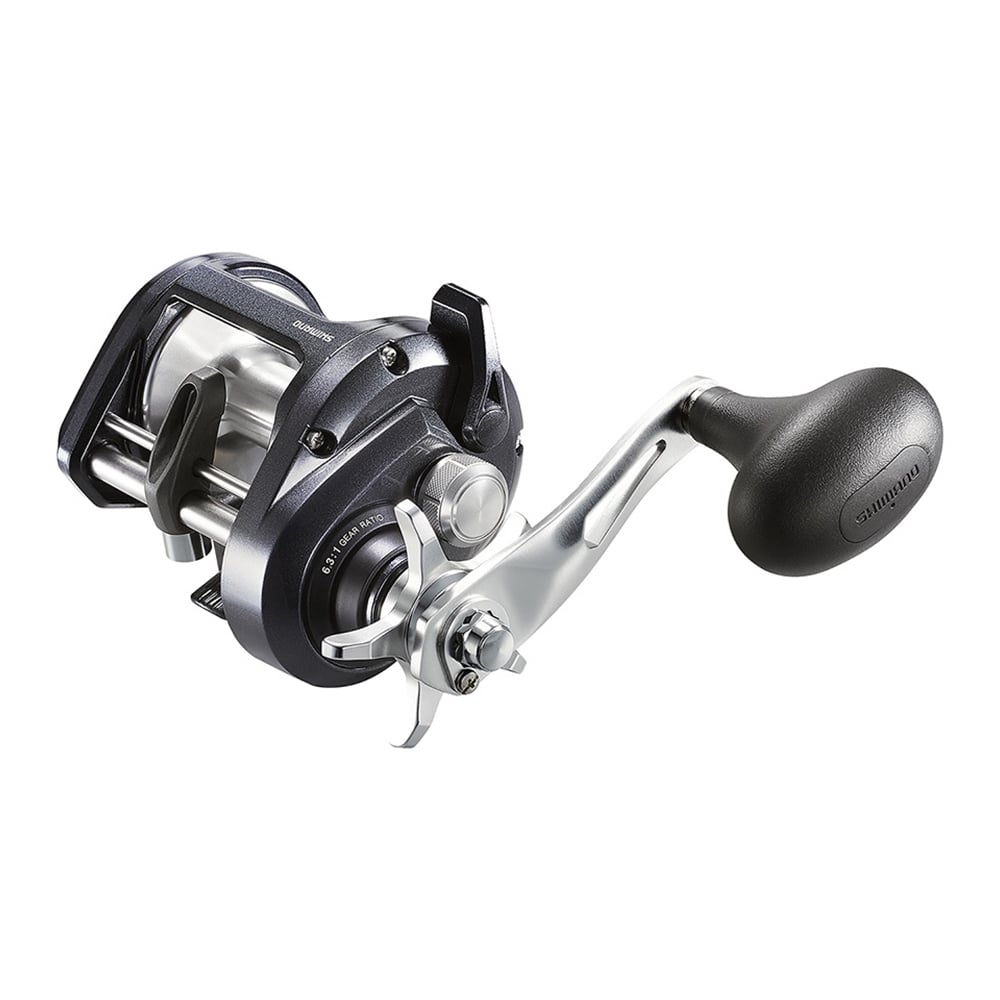 A close-up of the Shimano Tekota 501HGA 6.3:1 Left Hand Casting Reel (TEK501HGA) in silver and black, featuring a large ergonomic handle and durable, corrosion-resistant design for smooth operation.