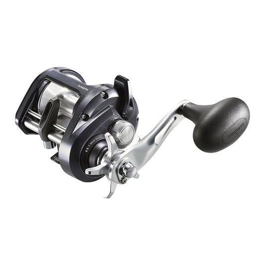 A close-up of the Shimano Tekota 501HGA 6.3:1 Left Hand Casting Reel (TEK501HGA) in silver and black, featuring a large ergonomic handle and durable, corrosion-resistant design for smooth operation.