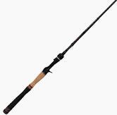 The Phenix Ultra MBX Casting Rod 7'0" Extra Heavy (PHX-UMBXCL-C700XH), featuring a black and brown design with a cork and foam handle, is shown diagonally on a plain white background.