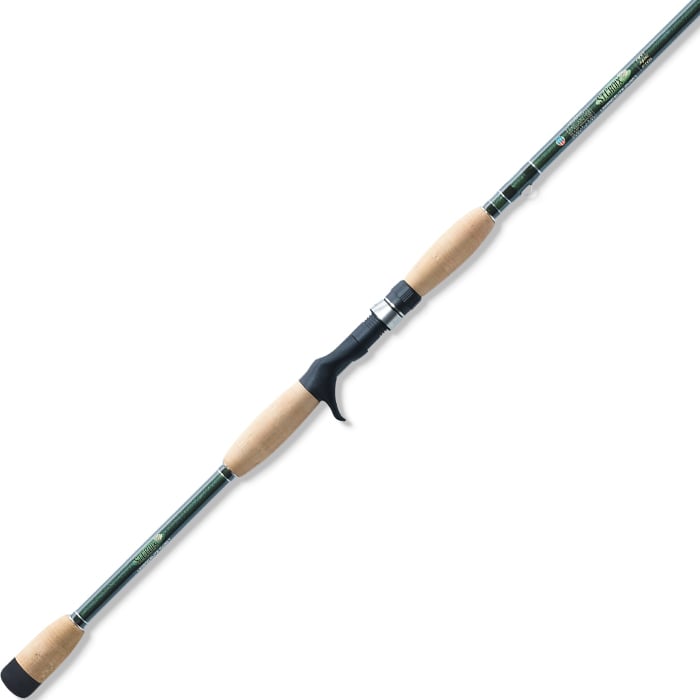 The St. Croix Legend Elite Musky 8'0" Medium Heavy Casting Rod features a cork handle with trigger grip, metal reel seat, and a slender graphite shaft with green and black accents—perfect for musky anglers seeking top St. Croix technology.