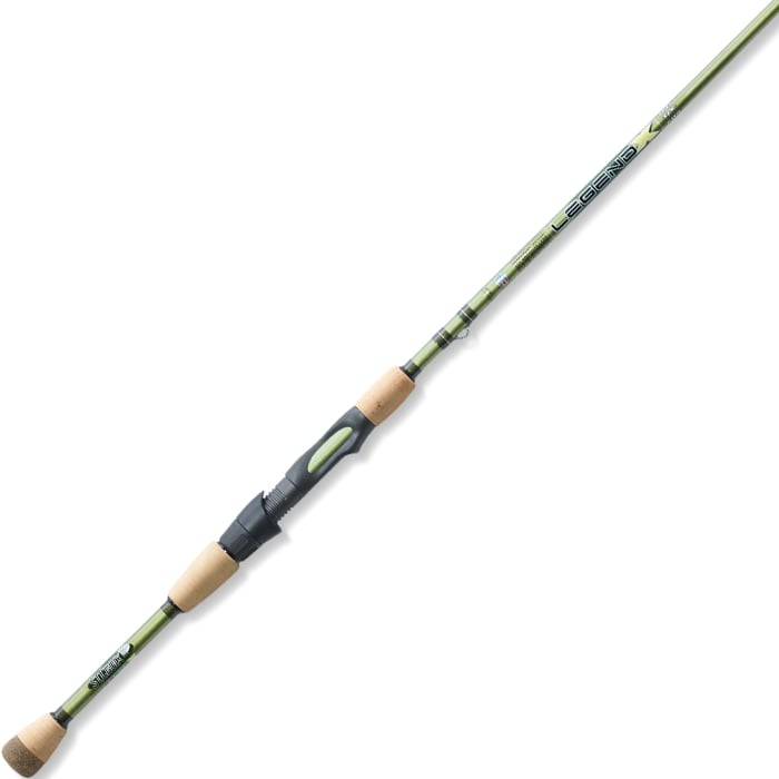 A St. Croix Legend X 6'10" Medium Light Spinning Rod (XLS610MLXF) in green with cork handles and a black reel seat, shown on a white background. Features Advanced Reinforcing Technology and distinctive "Legend" branding.