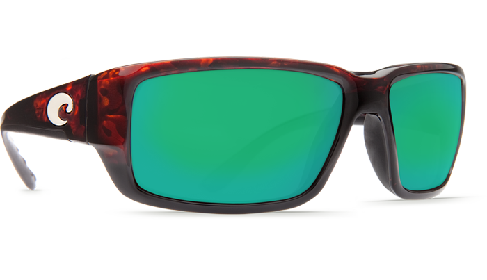 The Costa Del Mar Fantail sunglasses feature a tortoiseshell frame, reflective green polarized lenses, and a white wave logo—perfect performance sport fishing eyewear from Costa Del Mar.