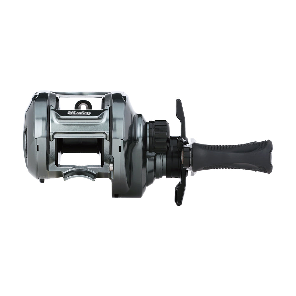 The Bates Fishing Co. Hundo'50 Casting Reel 6.3:1 RH (BRH50RH631) features a silver and black design with a large handle, displayed from the side against a white background.
