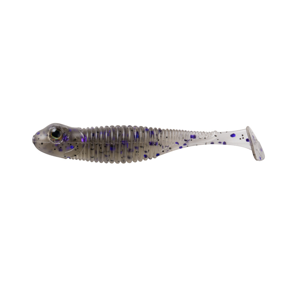 The Great Lakes Finesse Dropkick Shad 2.75" 6pk is a soft plastic paddle tail swimbait shaped like a small fish, with a ribbed, translucent body and purple-black speckles for realistic action.