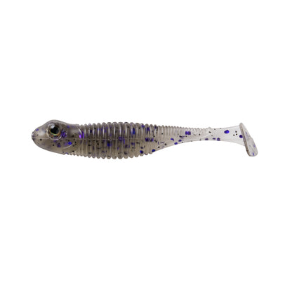 The Great Lakes Finesse Dropkick Shad 2.75" 6pk is a soft plastic paddle tail swimbait shaped like a small fish, with a ribbed, translucent body and purple-black speckles for realistic action.