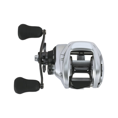 A Shimano Tranx 400 B Casting Reel 5.8:1 LH (TRX401B) by Shimano, featuring two black handles, is shown on a white background.