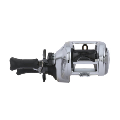 A Shimano Tranx 400 B Casting Reel 5.8:1 LH (TRX401B) in silver and black with a rotating spool, handle, and lever, shown from the side against a plain white background. Brand: Shimano.