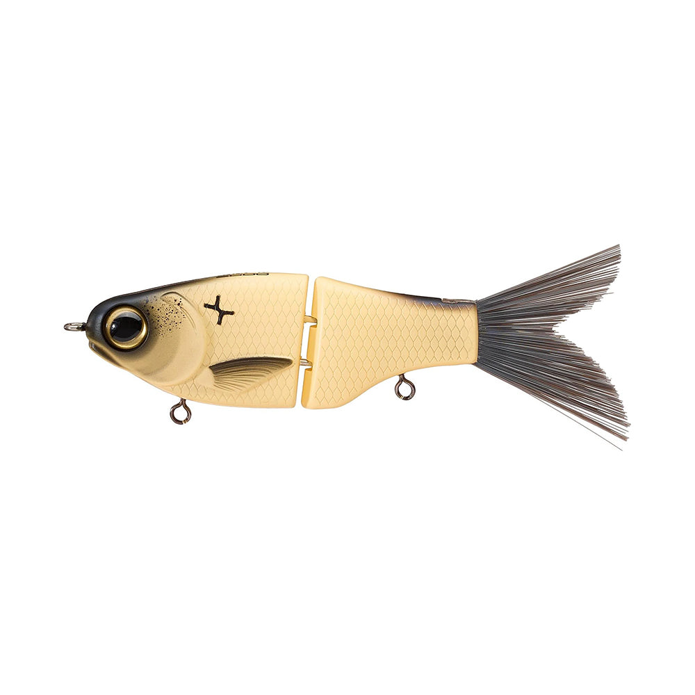 The SPRO KGB Lil Guy 120 is a segmented beige and gray swimbait shaped like a fish, with detailed scales, a large eye, and a flexible jointed body and tail.