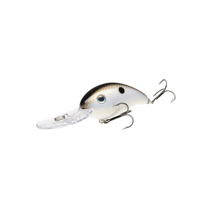 The Strike King 3XD Crankbait is a white and black bass lure with a silver eye, two treble hooks, and a clear plastic diving lip, designed by Strike King to mimic a small fish.